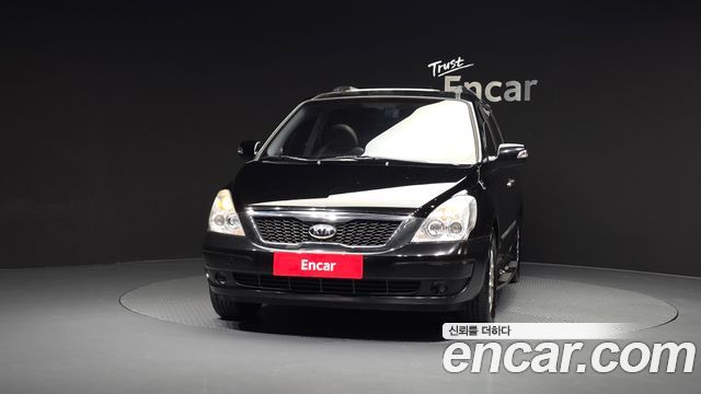 Kia Canival 2012 — photo 3