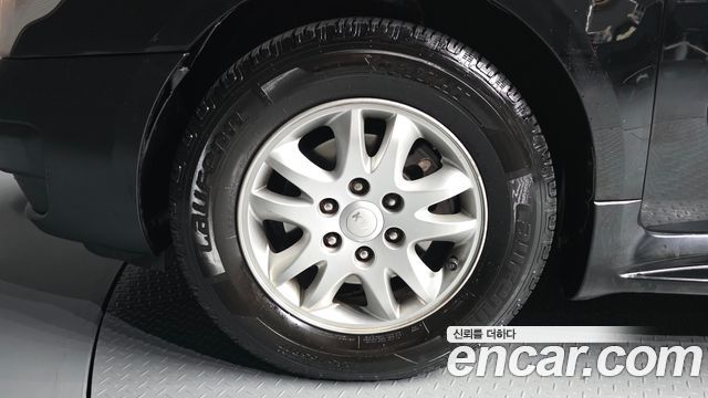 Kia Canival 2012 — photo 5