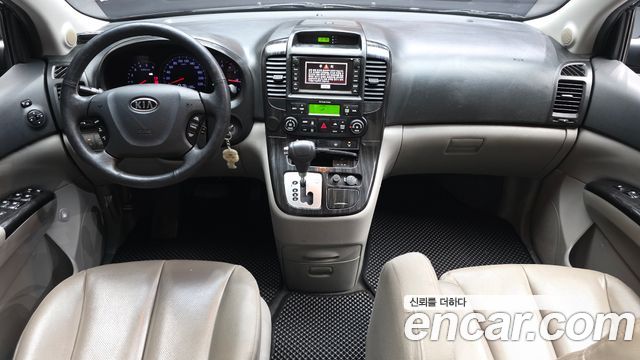 Kia Canival 2012 — photo 10