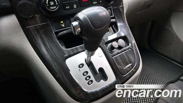 Kia Canival 2012 — photo 12