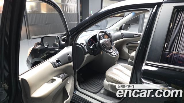 Kia Canival 2012 — photo 13