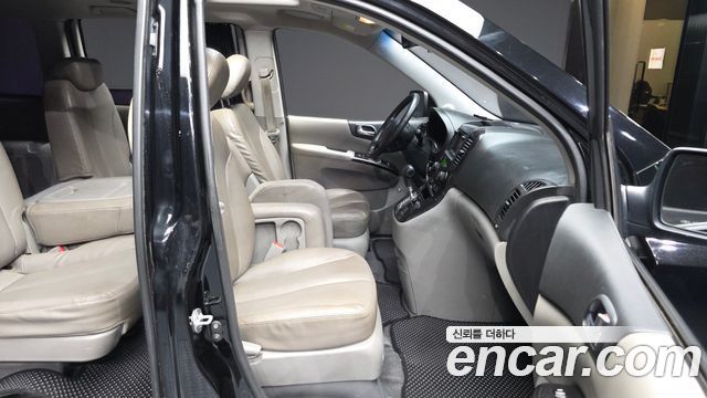 Kia Canival 2012 — photo 17