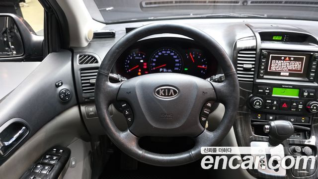Kia Canival 2012 — photo 19