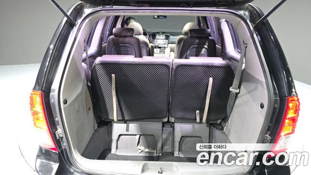 Kia Canival 2012 — photo 26