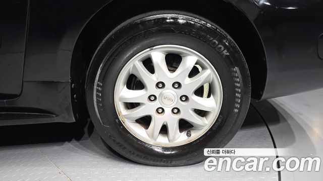 Kia Canival 2012 — photo 7