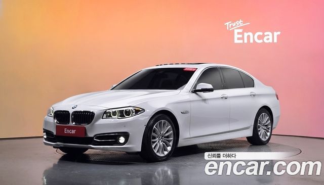 BMW 5-Series 2015 — photo 1