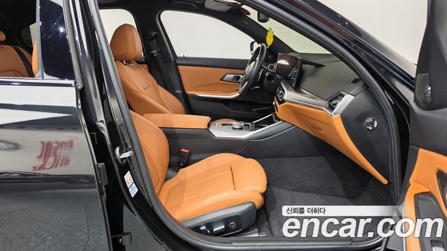 BMW 3-Series 2024 — photo 16