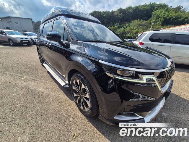 Kia Canival 2023 — photo 2