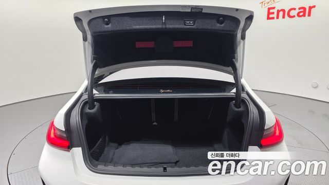 BMW 3-Series 2023 — photo 24