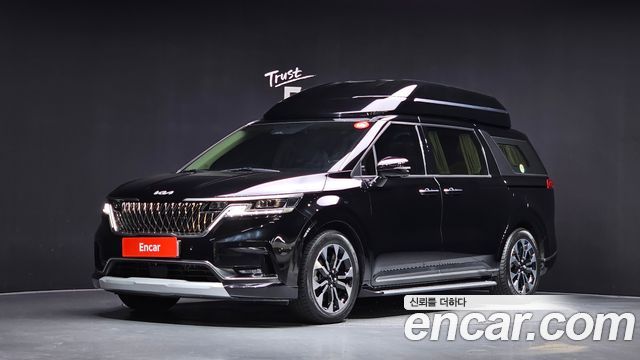Kia Canival 2023 — photo 1