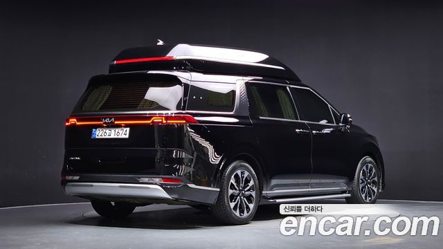 Kia Canival 2023 — photo 2