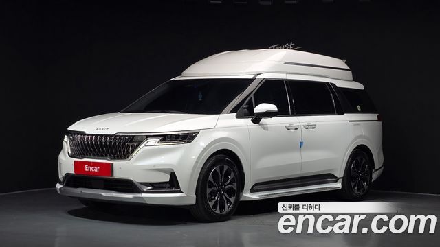 Kia Canival 2023 — photo 1