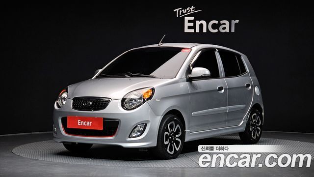 Kia morning 2011 — photo 1