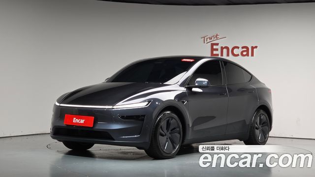Tesla Model Y 2025 — photo 35