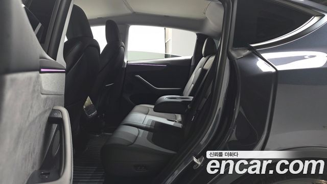 Tesla Model Y 2025 — photo 18
