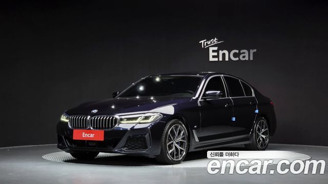 BMW 5-Series 2023 — photo 1