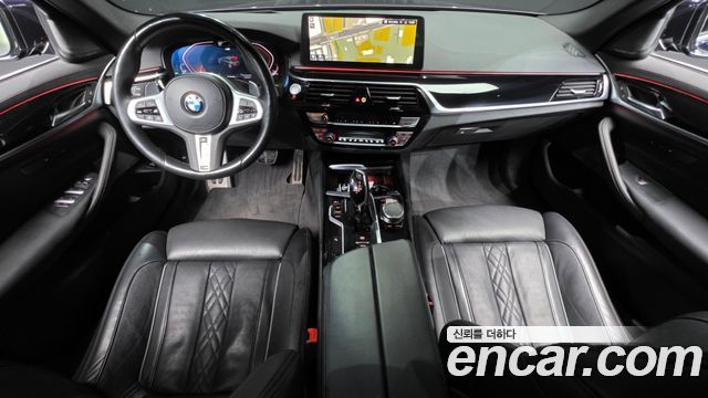 BMW 5-Series 2023 — photo 10