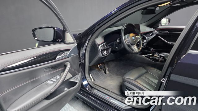 BMW 5-Series 2023 — photo 13
