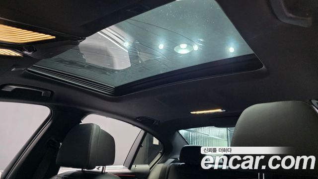 BMW 5-Series 2023 — photo 24