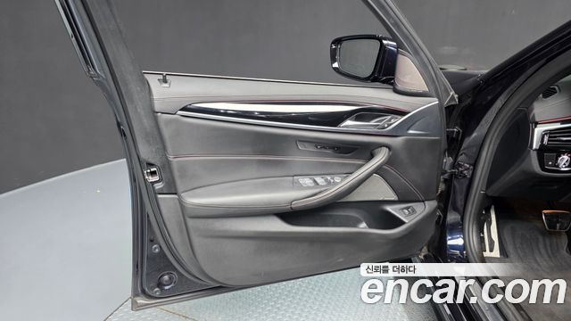 BMW 5-Series 2023 — photo 14