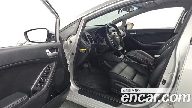 Kia K3 2014 — photo 13