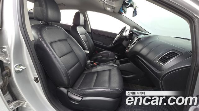 Kia K3 2014 — photo 16