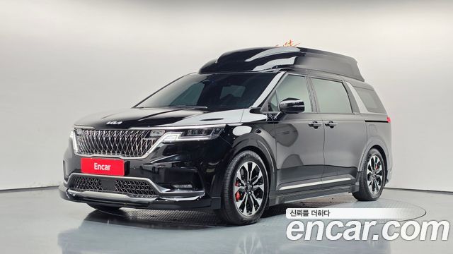 Kia Canival 2023 — photo 1