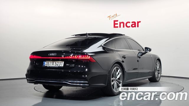 Audi A7 2021 — photo 2