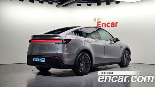 Tesla Model Y 2025 — photo 2