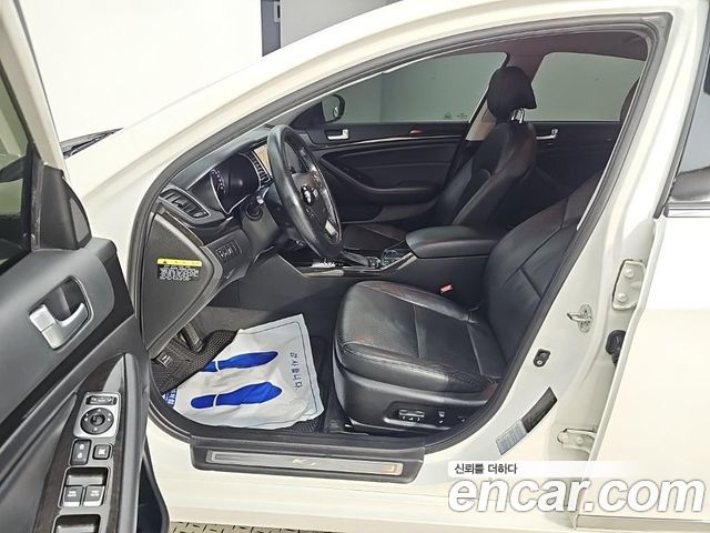 Kia K7 2013 — photo 11