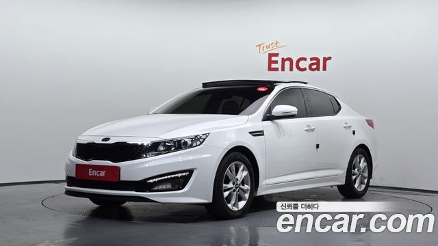 Kia K5 2011 — photo 1