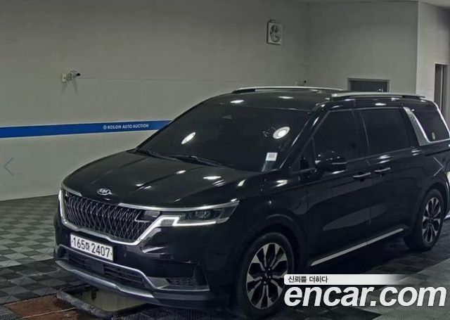 Kia Canival 2021 — photo 1