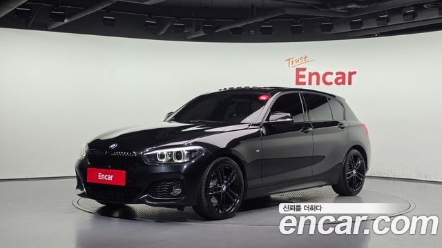BMW 1-Series 2018 — photo 1