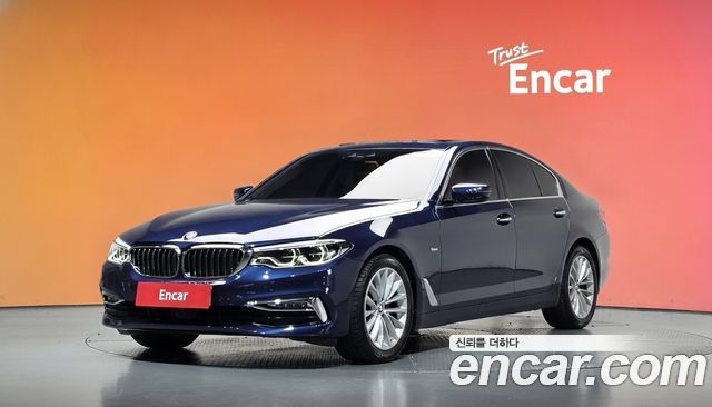 BMW 5-Series 2018 — photo 1