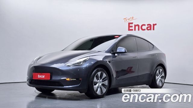 Tesla Model Y 2021 — photo 1