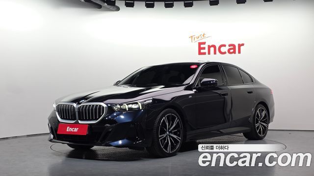 BMW 5-Series 2024 — photo 1