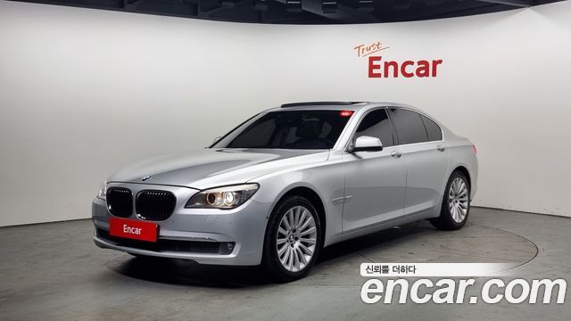 BMW 7-Series 2011 — photo 1