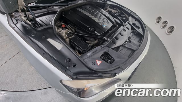 BMW 7-Series 2011 — photo 6
