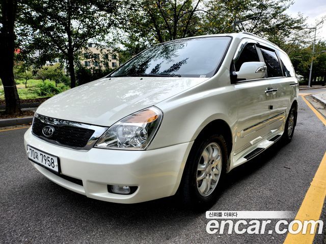 Kia Canival 2011 — photo 1