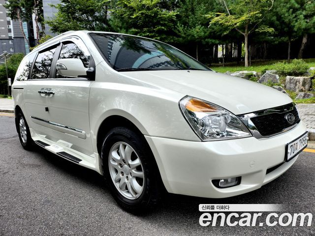 Kia Canival 2011 — photo 3