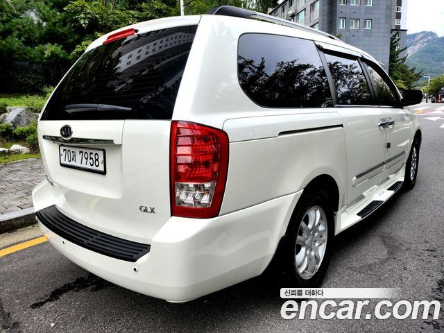 Kia Canival 2011 — photo 4