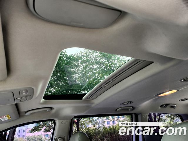 Kia Canival 2011 — photo 7