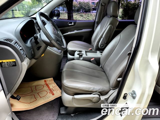 Kia Canival 2011 — photo 8