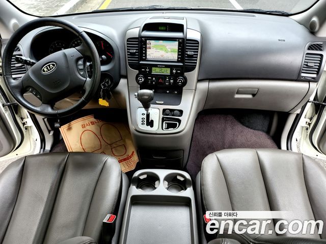 Kia Canival 2011 — photo 13