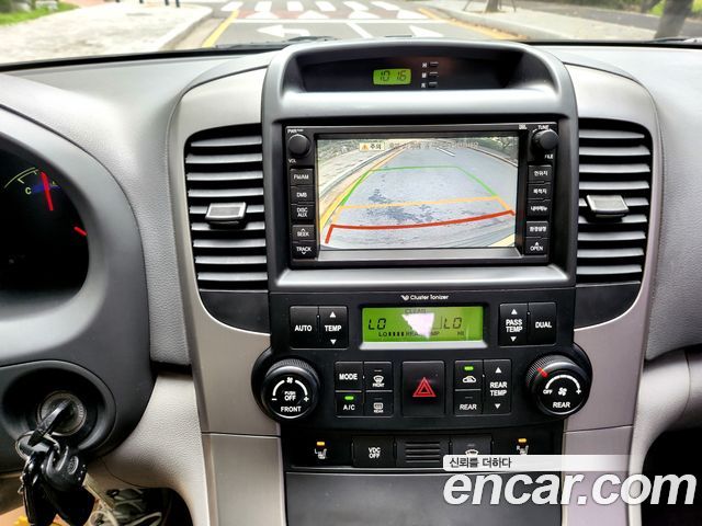 Kia Canival 2011 — photo 17
