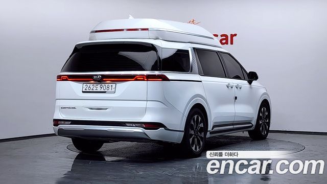 Kia Canival 2021 — photo 2