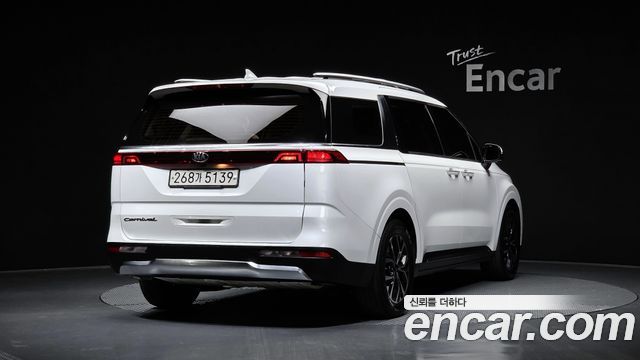 Kia Canival 2021 — photo 2