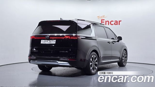 Kia Canival 2021 — photo 2