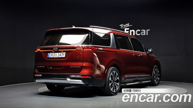 Kia Canival 2021 — photo 2