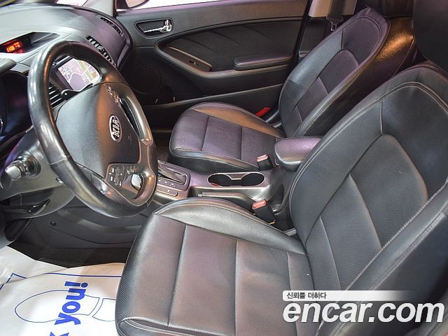 Kia K3 2013 — photo 12